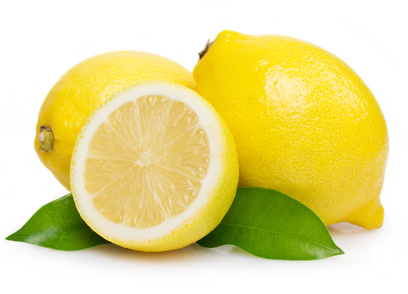 Fresh lemon with leaves